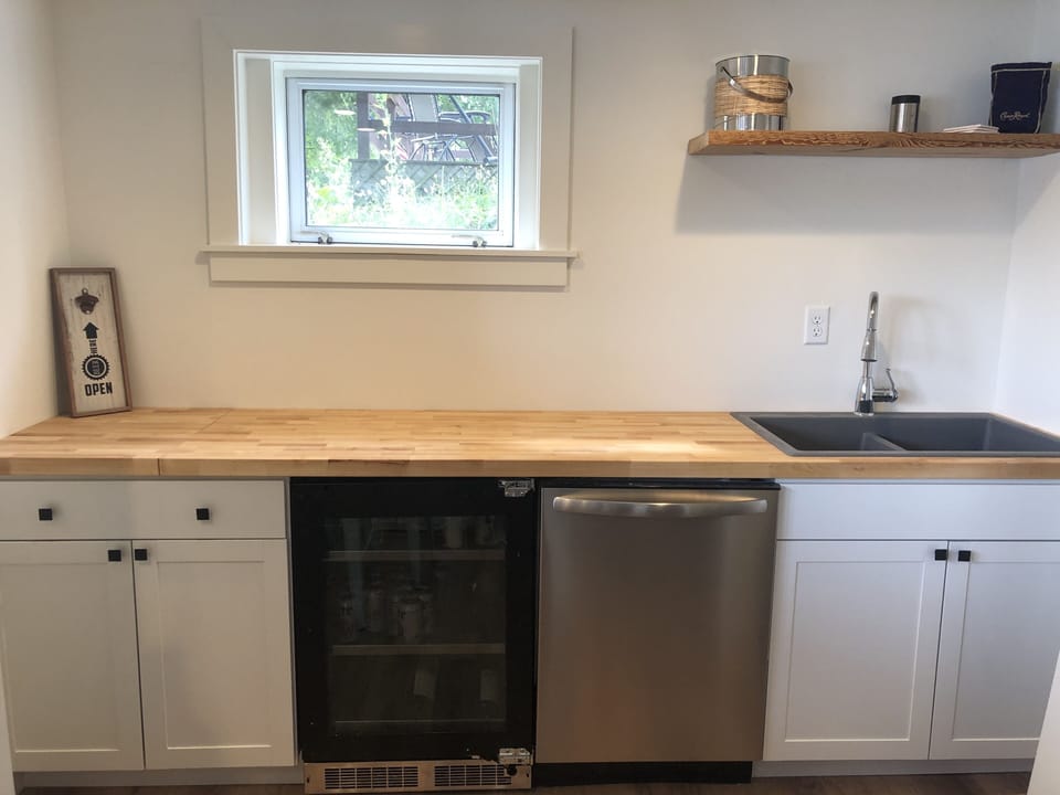 Lower lever wet bar convenient for all your libation needs.