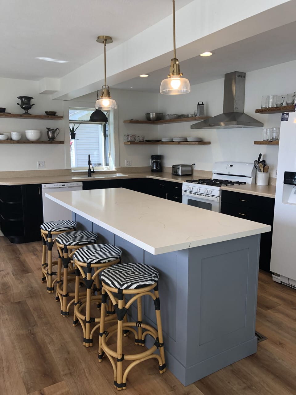 Stylishly renovated kitchen meets all your mealtime needs.