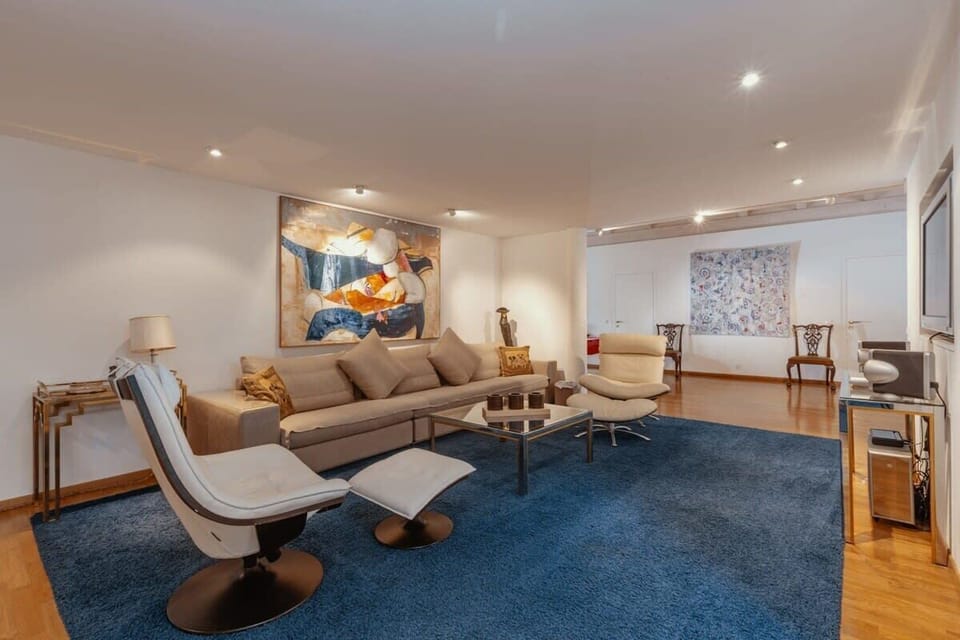living room sitting area in front of the tv 