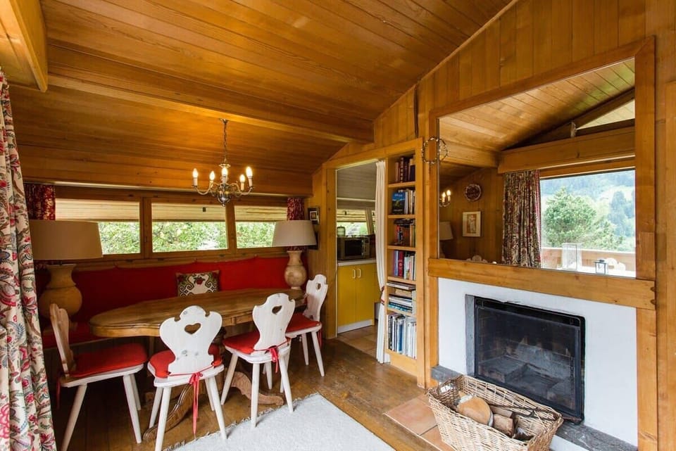 living room dinning area next to the warm fire place 