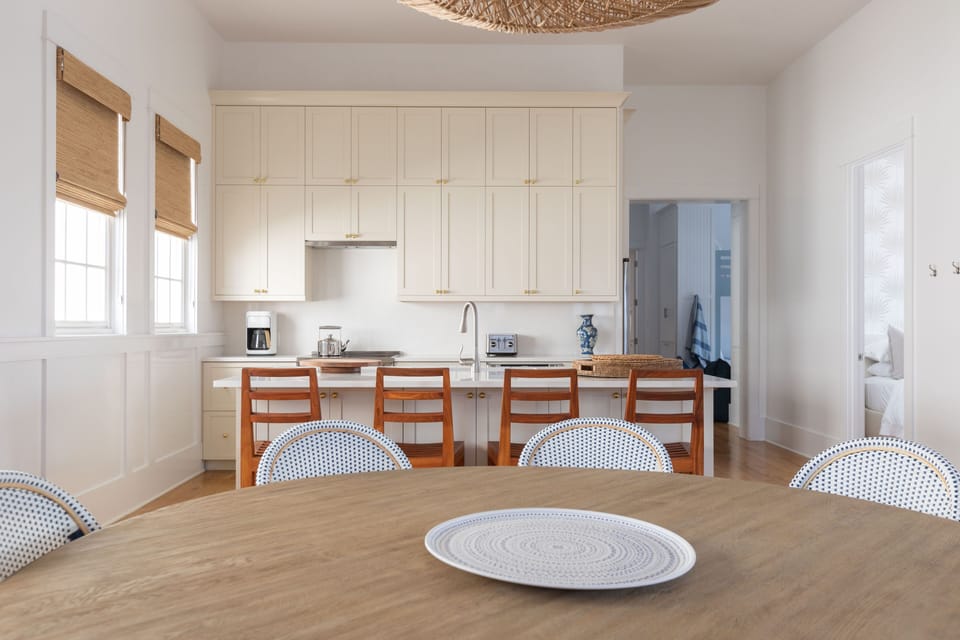 ROUND DINING TABLE SEATS EIGHT COMFORTABLY