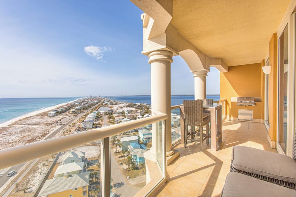 Step onto your private balcony and soak in sweeping views of the Gulf Coast, where turquoise waters meet sandy shores. Unwind on cushioned seating as ocean breezes and endless sunshine surround you—your perfect retreat awaits.