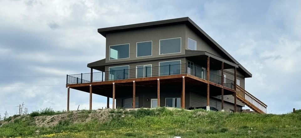 House as you approach from down the hill