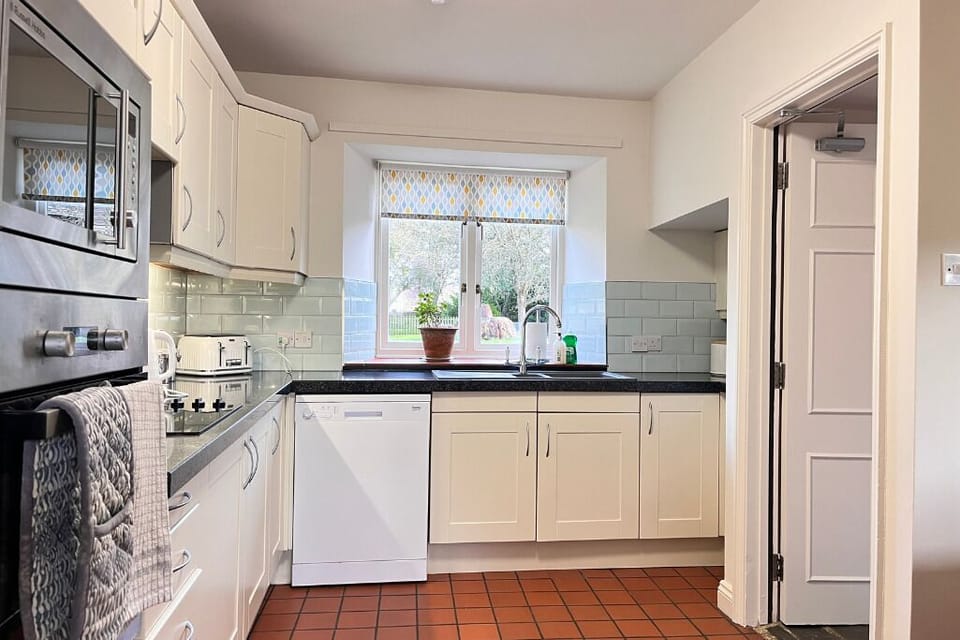 Full kitchen fitted with all mod-cons and ample crockery for 12.