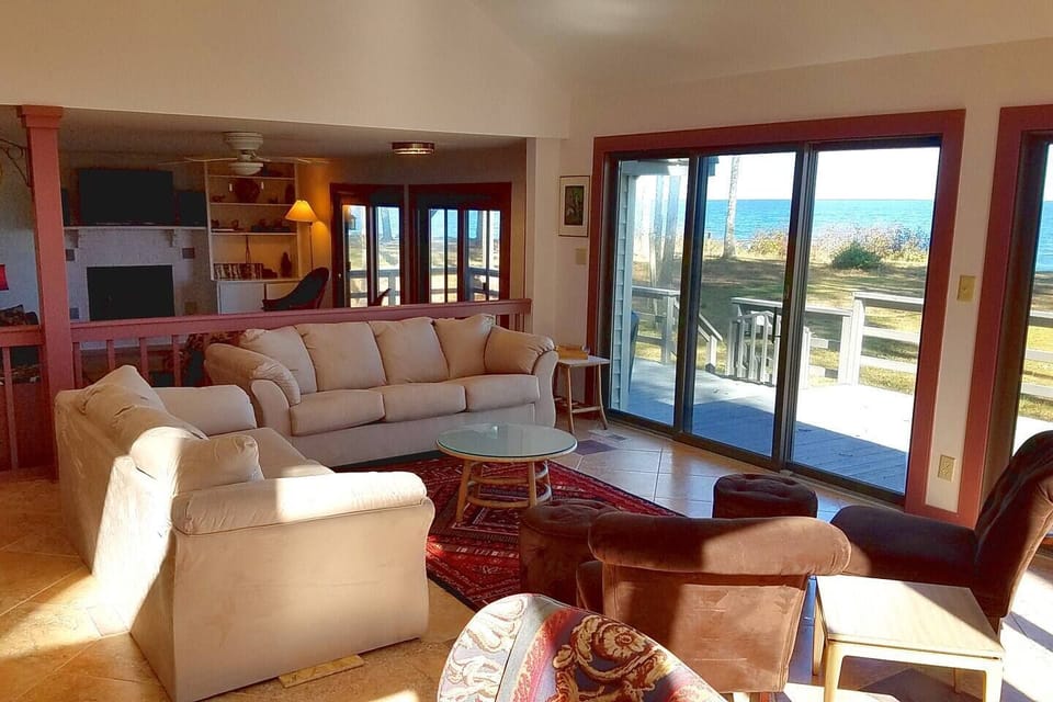 Main Living Room Area with sliding glass doors to deck  -> yard -> beach -> water!
