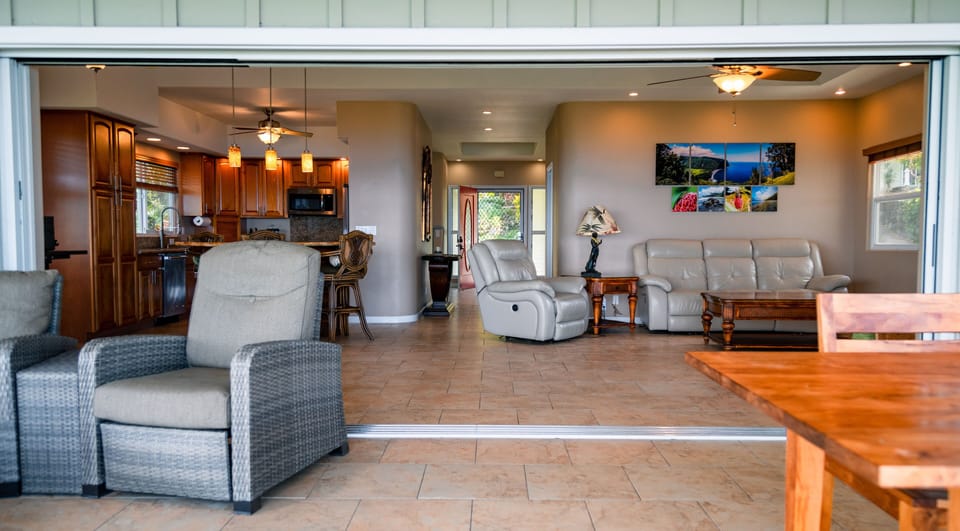 The interior spaces flow seamlessly to the outdoor space
