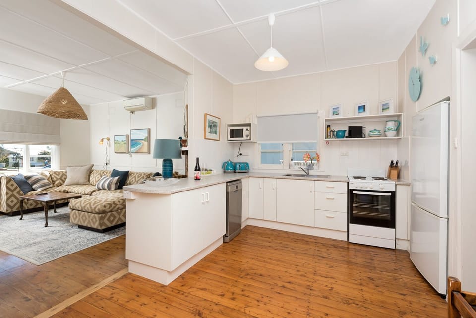Kitchen to lounge open living plan