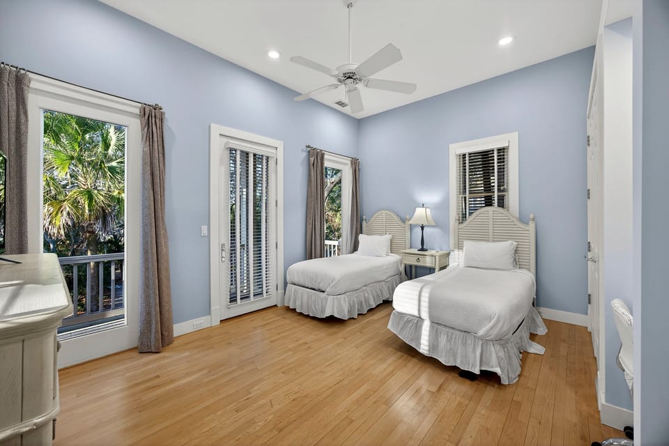 Bedroom 2:  Two Twins, TV, No Bath, Can Use The Downstairs Half Bath, Partial Balcony Access, Second Floor