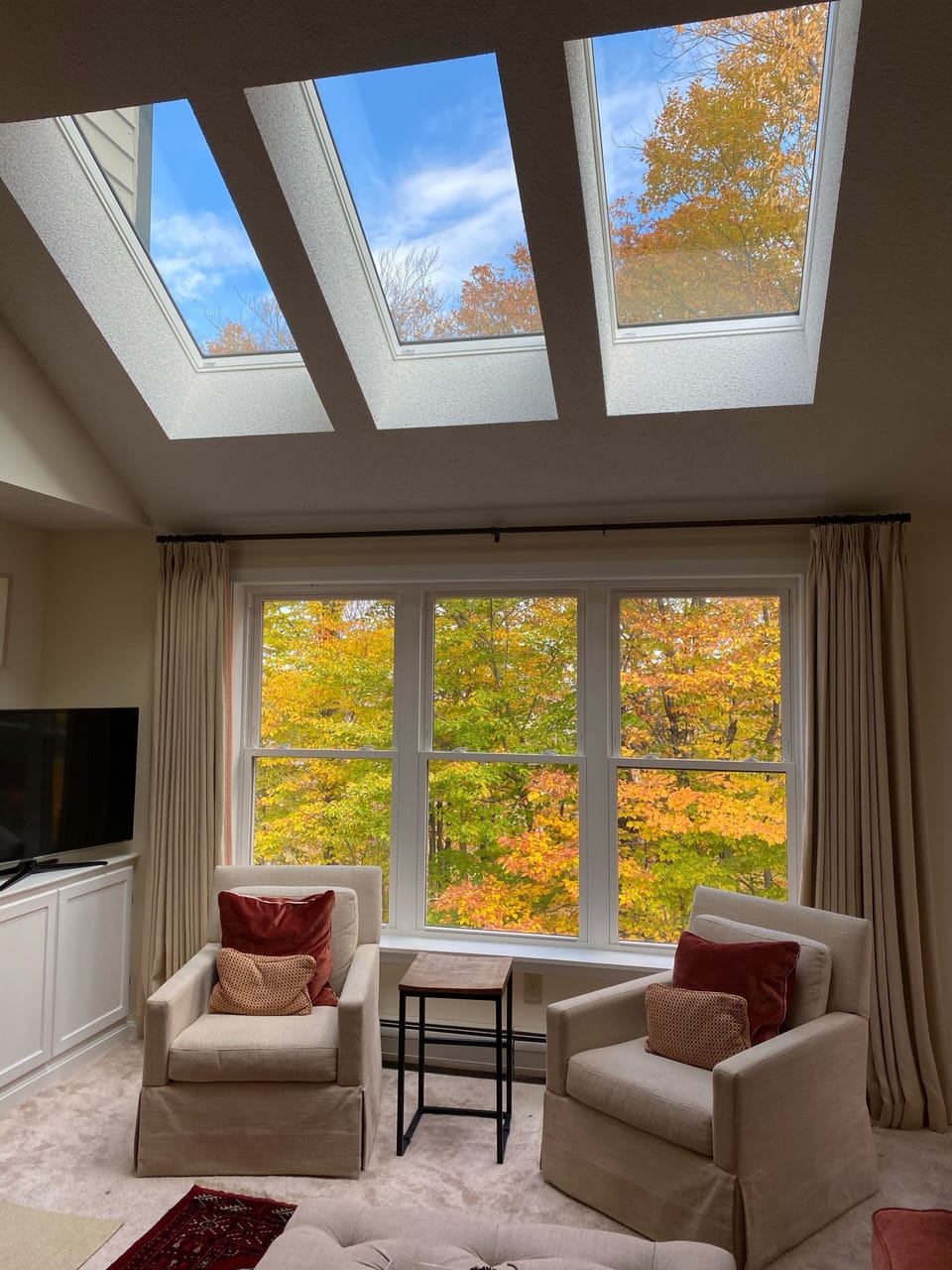 Skylights brighten space during cloudy days- mountain views in winter. 