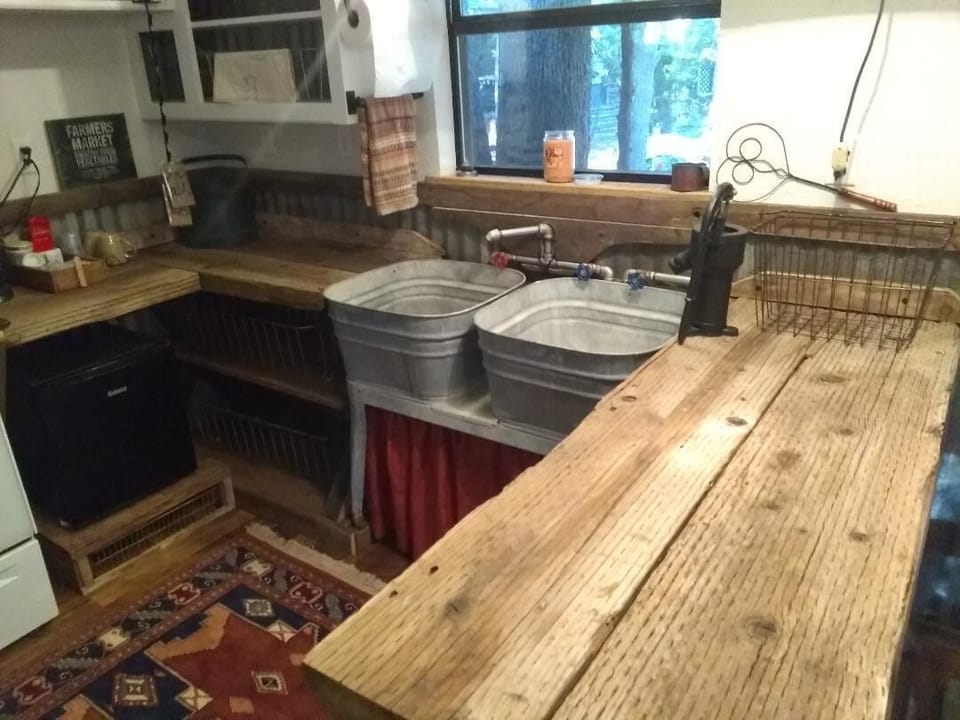 Repurposed items and old wood are perfect in our Lone Star cabin kitchen