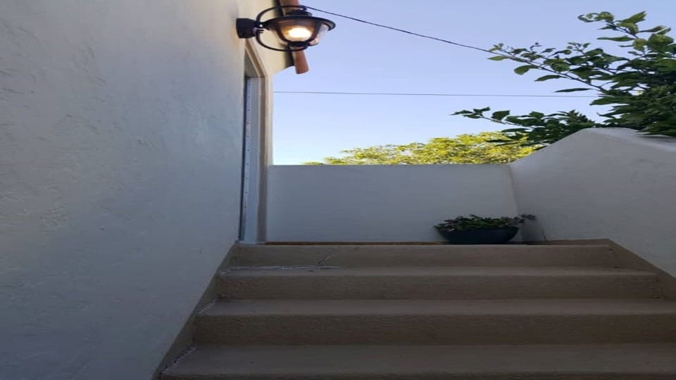 Up 9 stairs, it is very private and quiet.  come and go as you please.