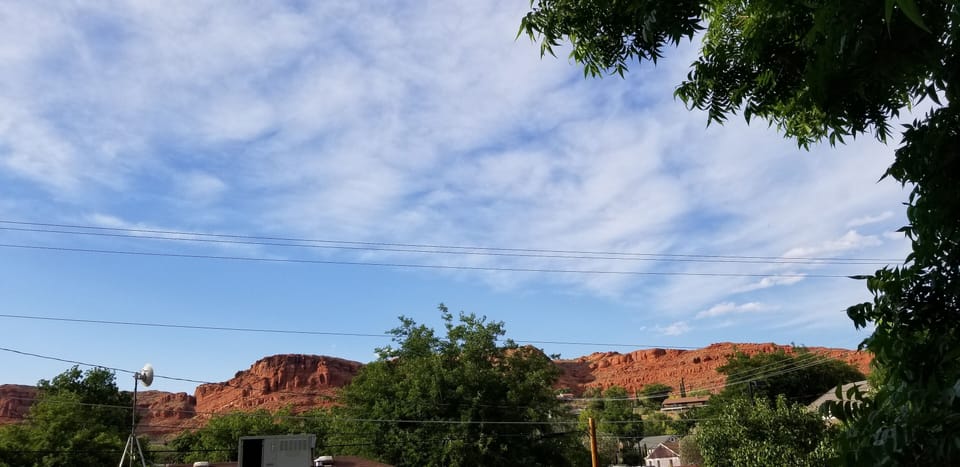 view of red cliffs to north from entry landing