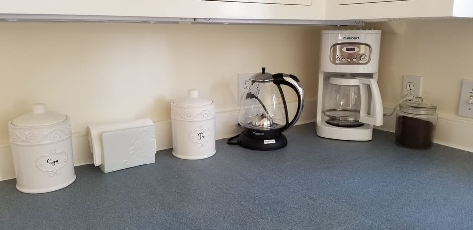 coffee maker, hot water kettle, Peets ground coffee, teas selection