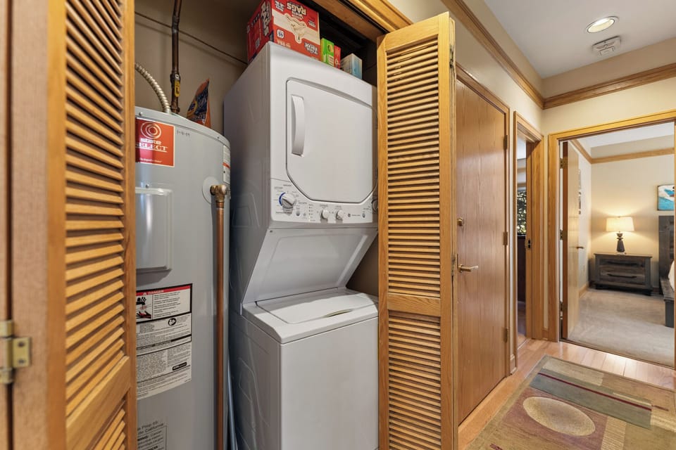 Your own washer and dryer await behind sleek louvered doors, making extended stays feel effortlessly comfortable.