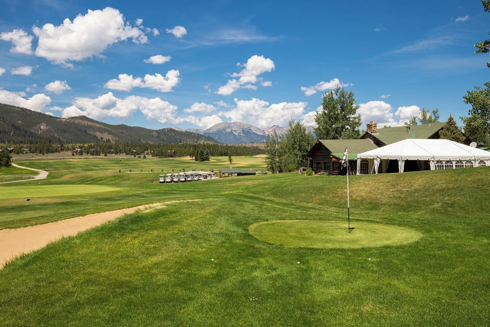 The property sits alongside a championship golf course with stunning mountain views, offering direct access to lush fairways and majestic Rocky Mountain scenery.
