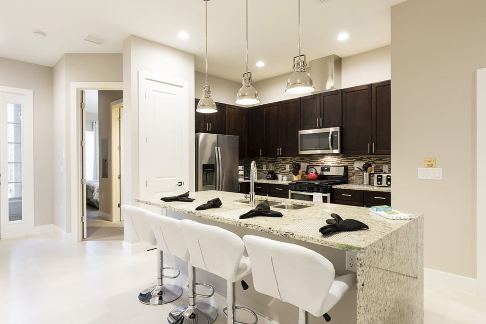 Our kitchens are fully equipped with stainless steel appliances, providing everything you need to cook and dine comfortably during your stay.