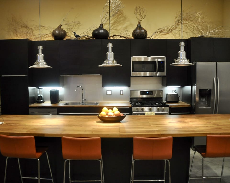 Kitchen with all stainless steel appliances