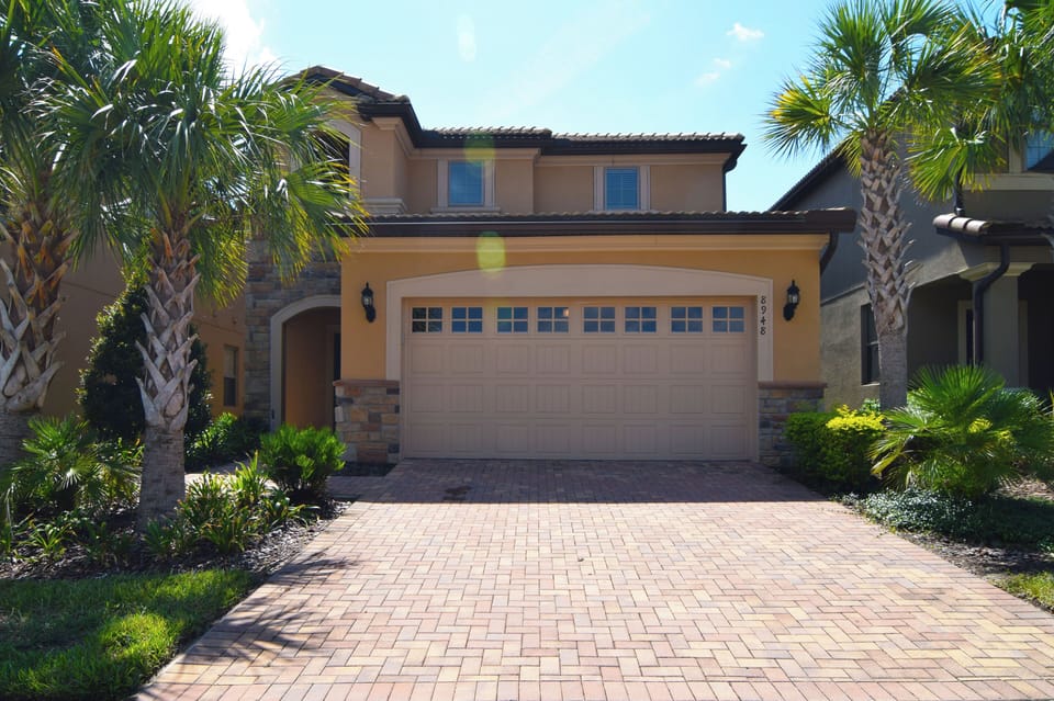 Front of this beautiful home with paved driveway for two cars