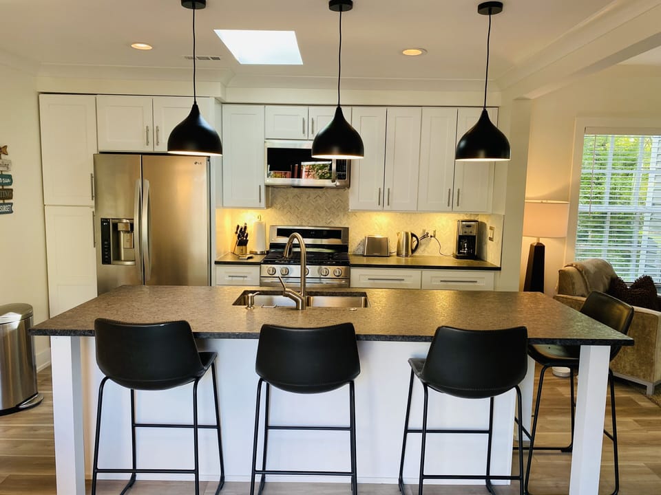 Kitchen with stainless steel appliances & touchless faucet