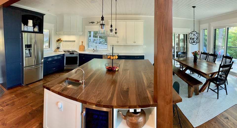 huge walnut top island with bar seating 