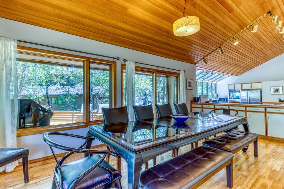 Plenty of seating for leisurely meals with easy access to kitchen and BBQ deck