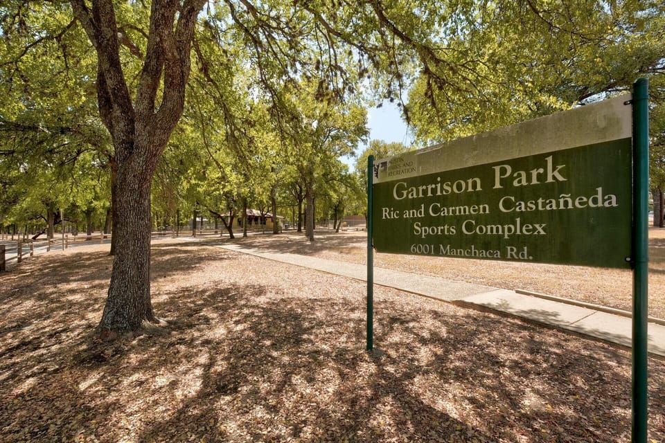 Neighborhood park and playground for kids and pets.
