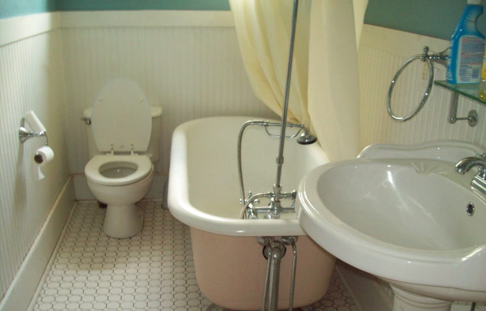 Bathroom with claw foot tub