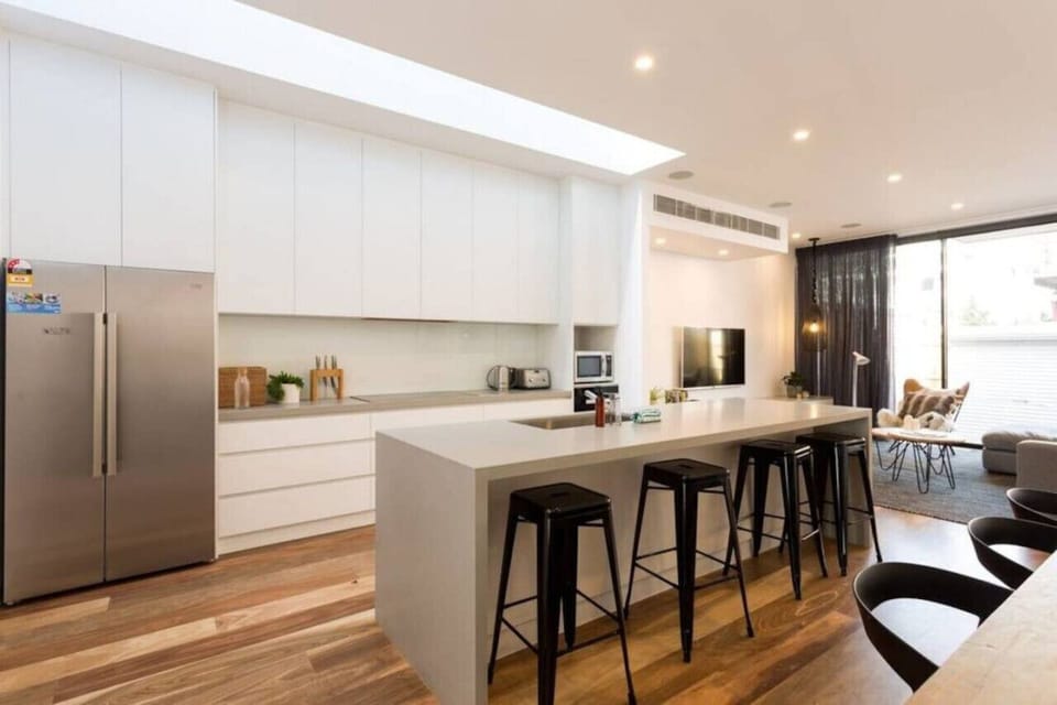 A well-designed and fully equipped kitchen gives the opportunity for happy get-togethers, food, drinks, or a simple breakfast. The kitchen includes most everything you could need during your stay.