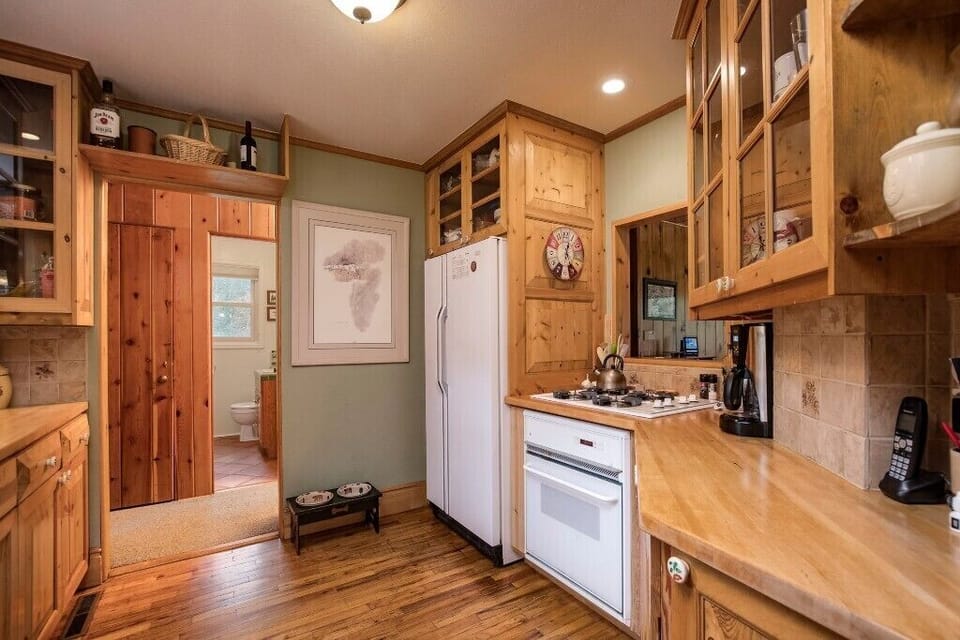 View of kitchen into the main bathroom