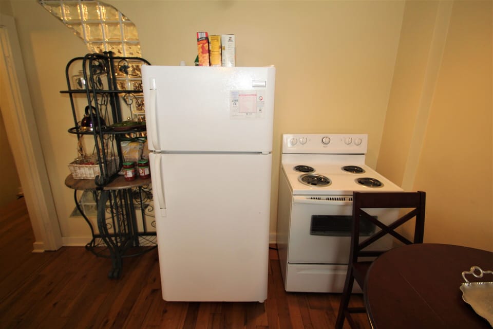 Full Kitchen with full size fridge and electric stove