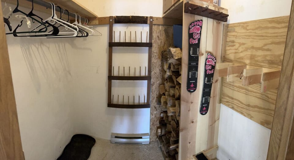 The large walk-in gear closet is perfect for storing all your gear, including big skis and boards. It also comes stocked with plenty of firewood for a cozy weekend.