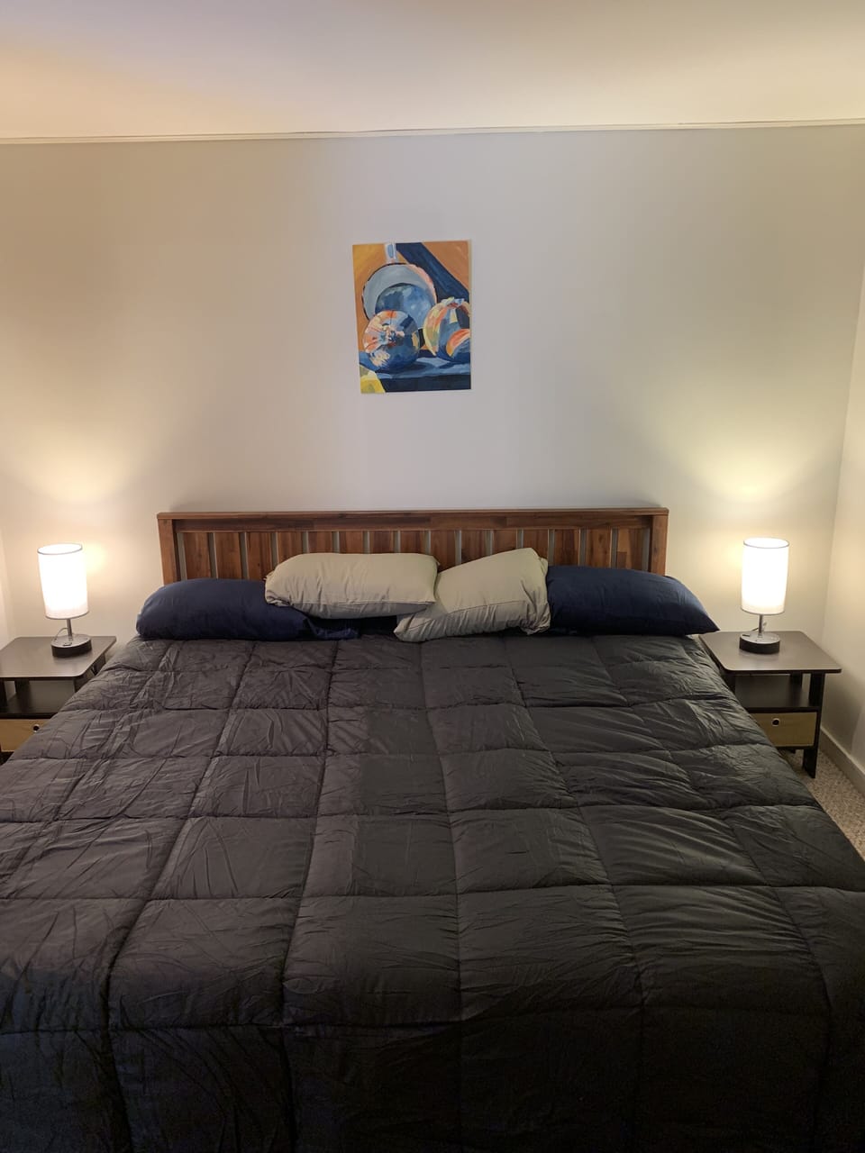 Master bedroom with king size platform bed.