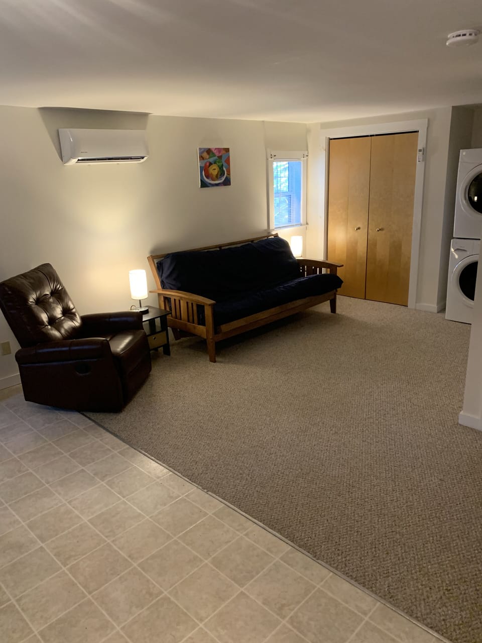 Living room area with heat pump (heat/ac) 