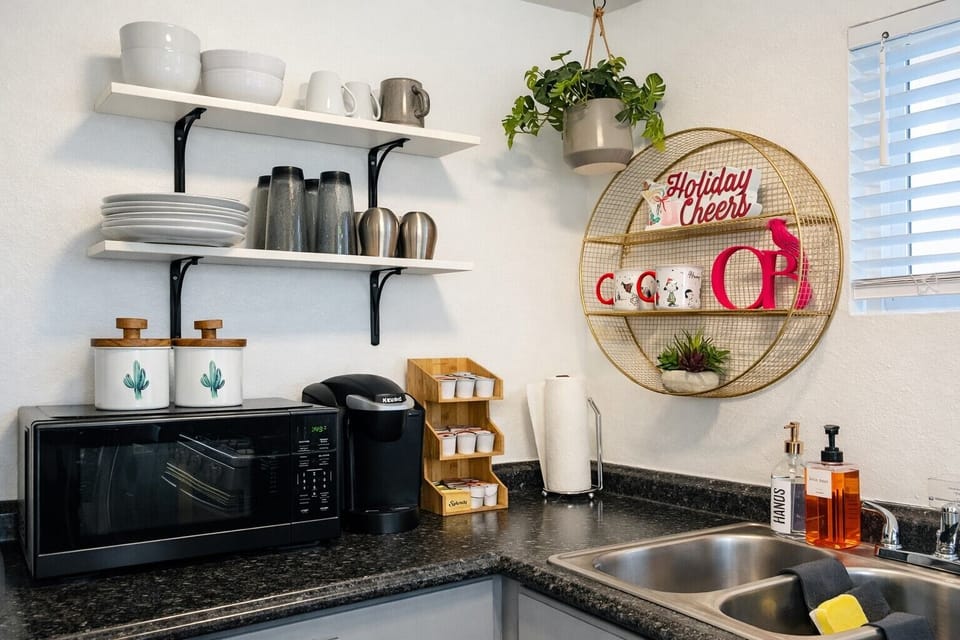Keurig Coffee maker, microwave and provided coffee pods. 