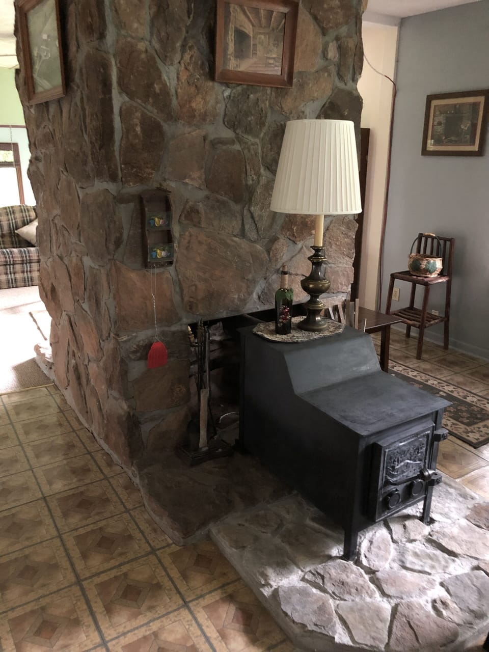 Seasonal wood heater in kitchen