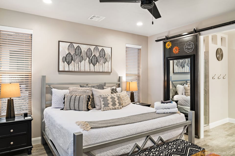 Master king suite featuring top of the line mattress and large flat screen tv