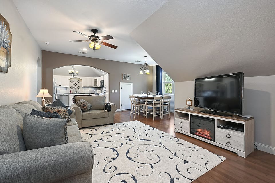 Everything is NEW. Faux fireplace, 55" TV, queen sofa bed,  google mini Loveseat