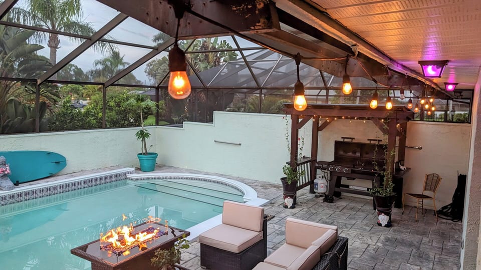 Patio pool, furniture, fire pit, new bbq grill  (gas/charcoal) under pergola