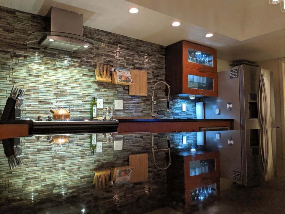 Kitchen island, guest bathroom to your right. 