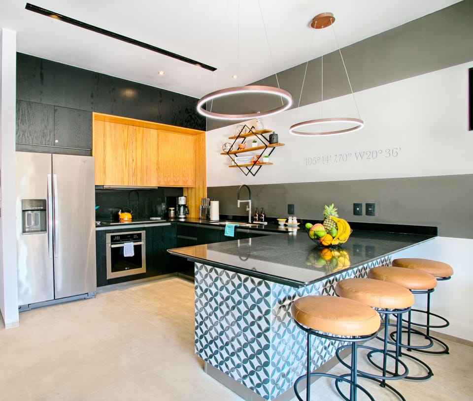Eat breakfast or entertain guests at the bar