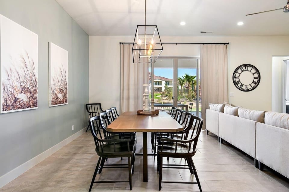 Dining room opens to patio area with additional table seating