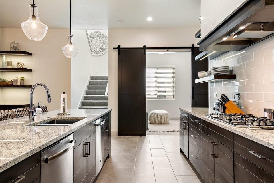Spacious kitchen with 2 dishwashers - make light work of the dishes after meals