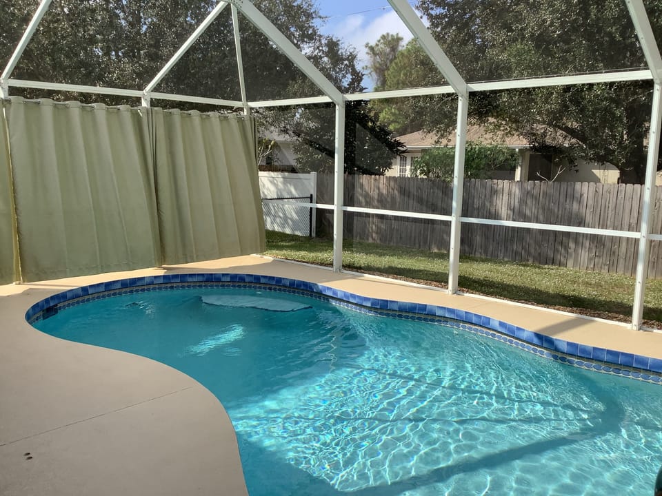 With privacy panels and a seating ledge inside the pool.