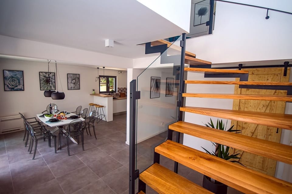 Main entrance in the property and stairs which leads to upper floor