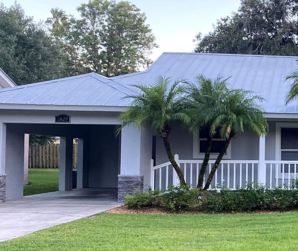 Carport and driveway for guest use.