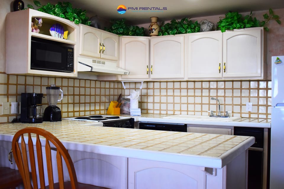 Kitchen equipped with basic cooking utensils