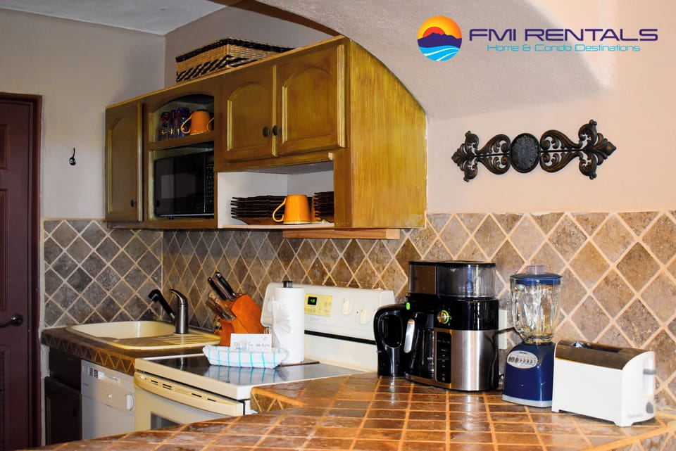 Kitchen completely equipped with basic cooking utensils
