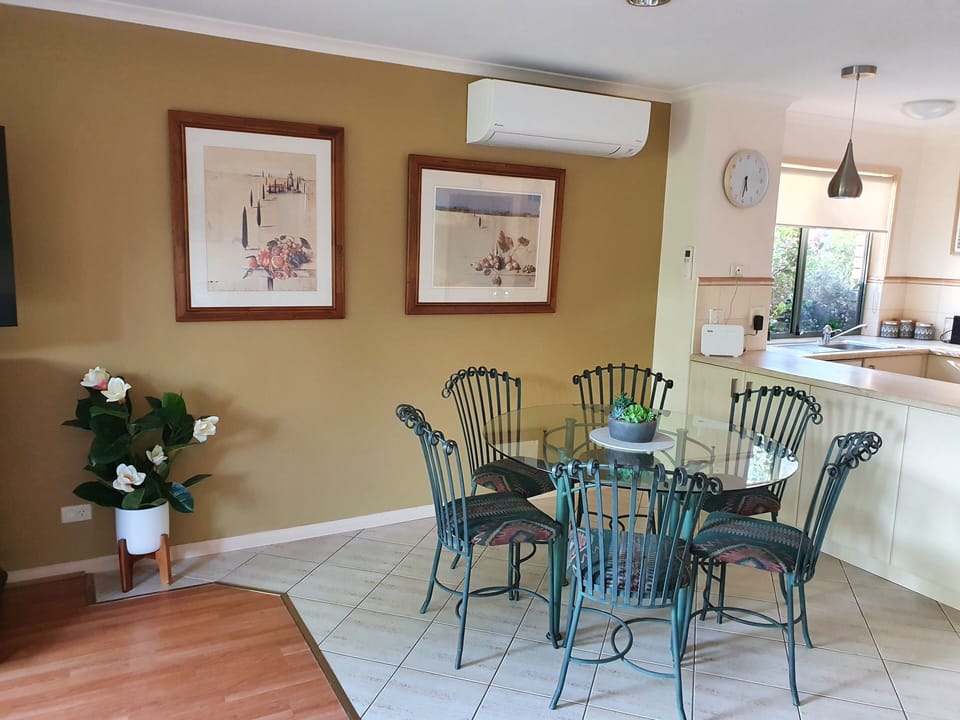 Dining area that seats 6 people for dinner