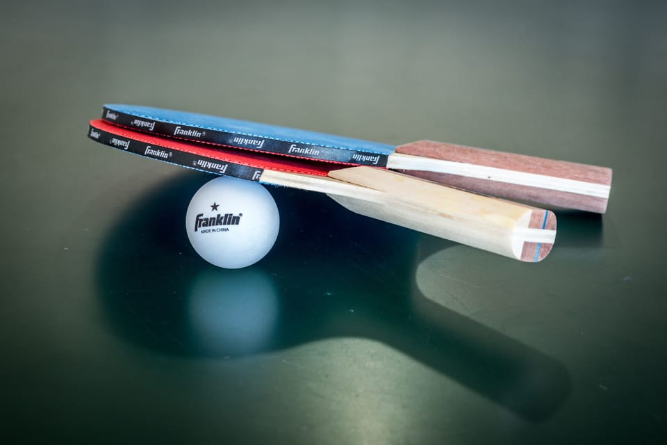 Play ping pong in the garage while you catch a game on TV!