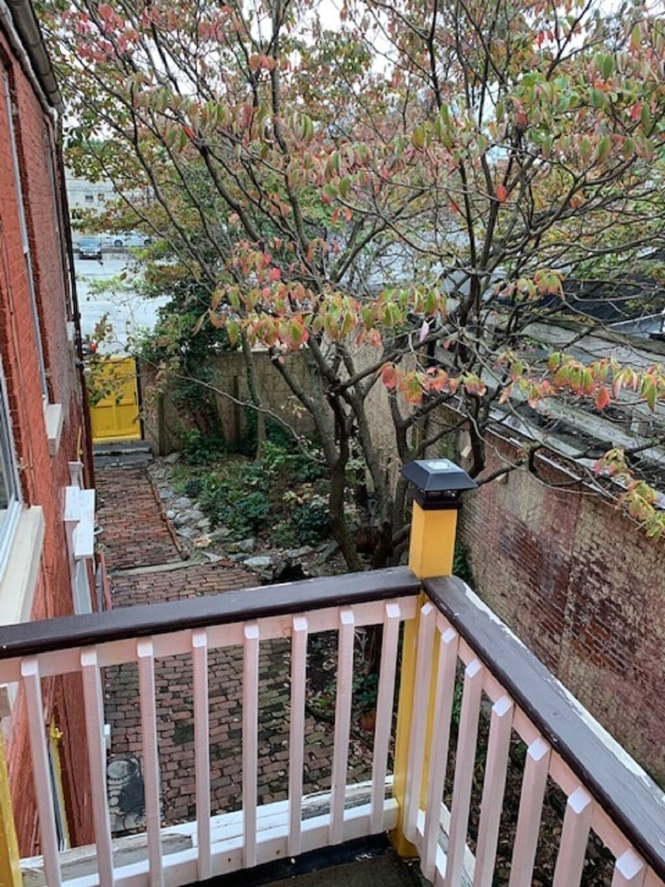 Enjoy your balcony overlooking the courtyard outside of the apartment